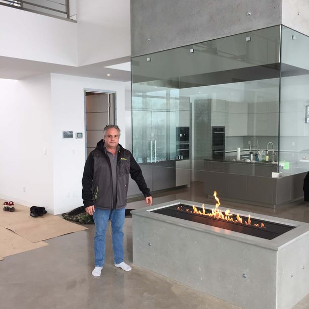 man standing near fire 
